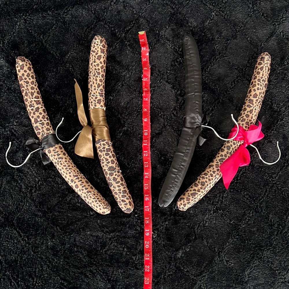 Four silk/satin hangers - sold as a set.